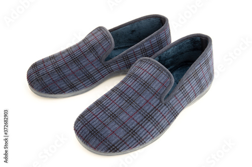 Male home slippers isolated on white background. Winter domestic shoes