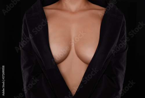 Topless beauty woman body covering her big breast