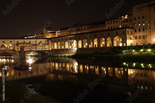 View of Ponte Vecchio bridge at night in Florence  Tuscany  Italy
