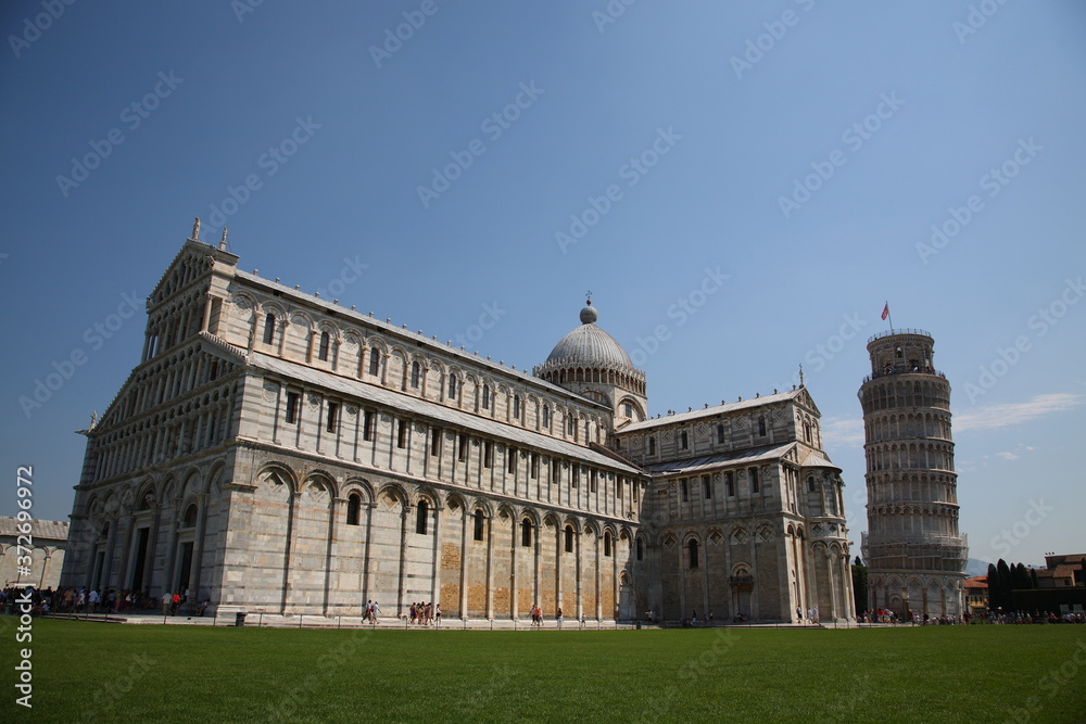 View of Pisa Leaning Tower and the Cathedral in Pisa, Italy