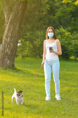 Young woman in protective m...