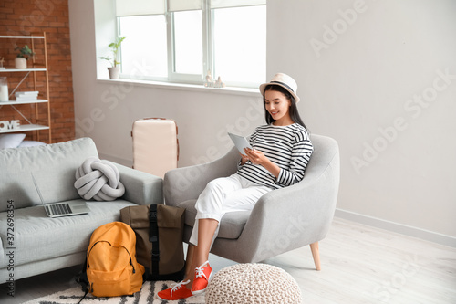 Woman with tablet computer ...