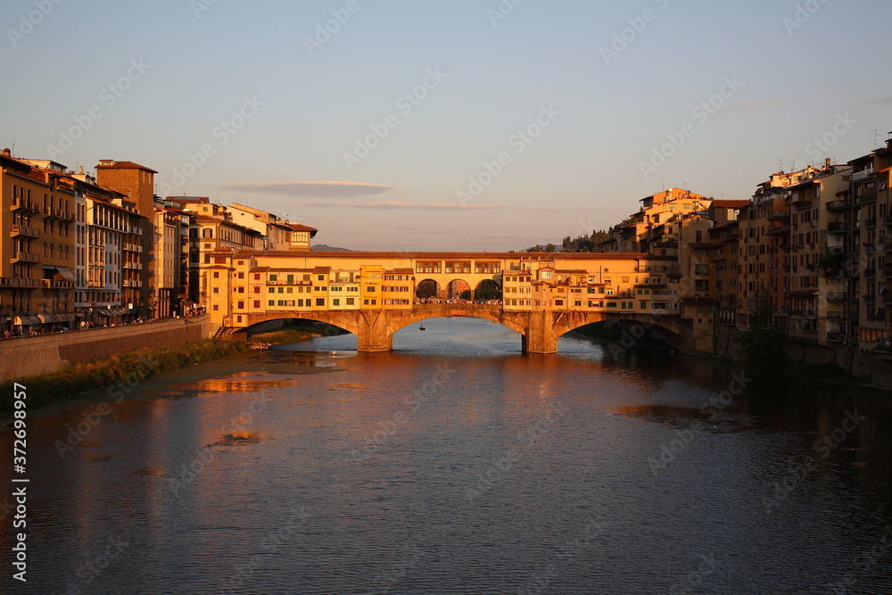Fototapeta premium View of Ponte Vecchio bridge during sunset in Florence, Tuscany, Italy