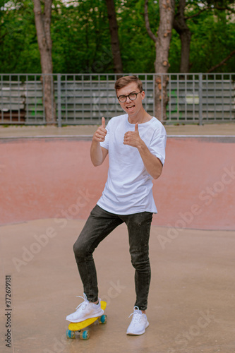 Cheerful little boy hand finger top like, great and super. Training and learning ride skateboard