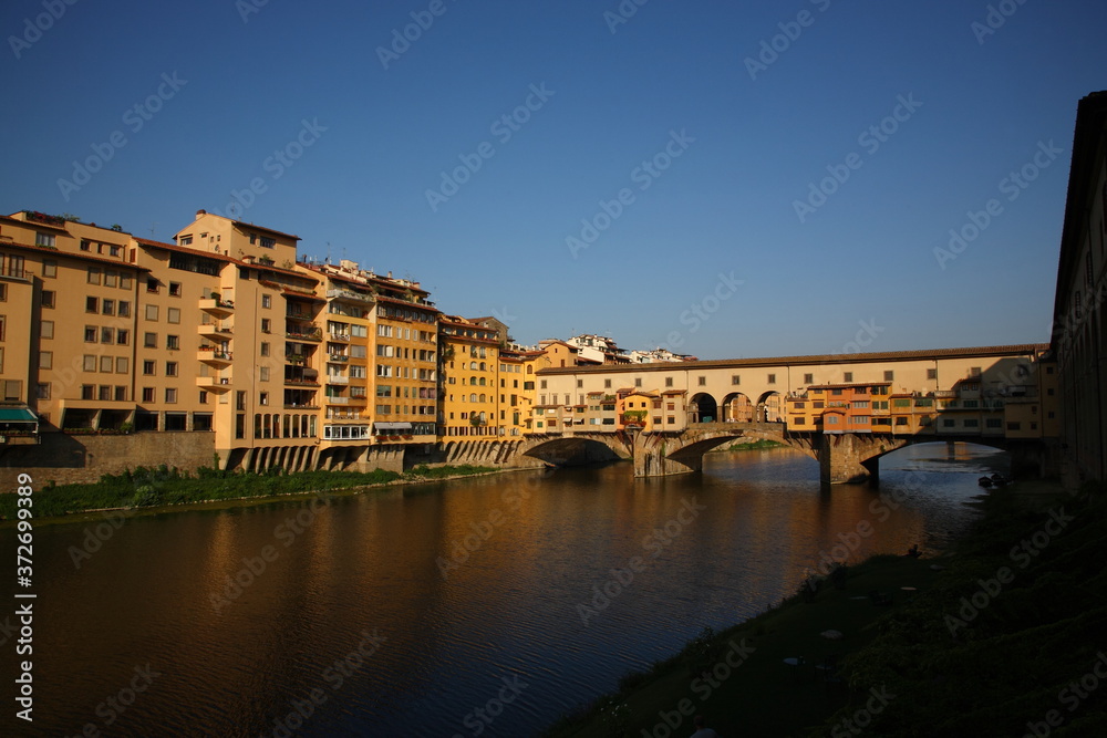View of Ponte Vecchio bridge during the sunrise in Florence, Tuscany, Italy