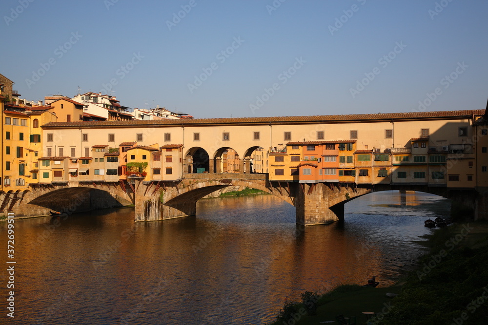 View of Ponte Vecchio bridge during the sunrise in Florence, Tuscany, Italy