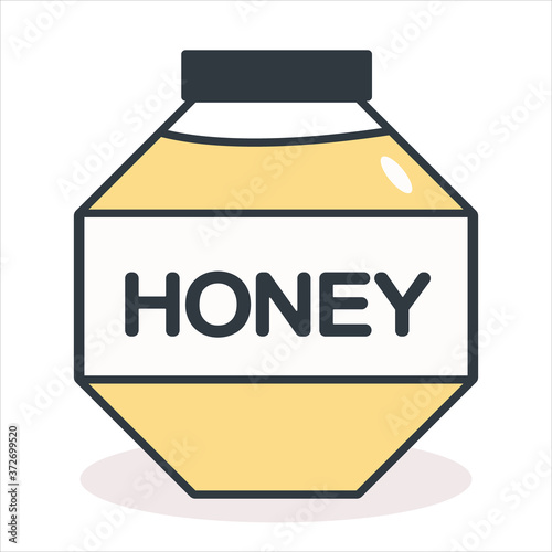 A jar of fresh flower honey with label