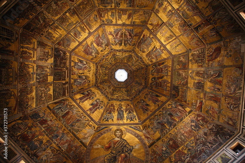 View of Golden mosaic of Jesus Christ on Baptistery of San Giovanni ceiling interior in Florence, Italy