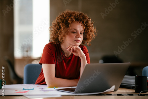 Beautiful businesswoman working on projects. Young businesswoman working in the office