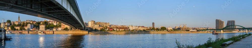 Beautiful summer panoramic view of the historic center of Belgrade from the bank of the Sava River near Branko's bridge (Brankov most), Serbia. People and signs unrecognizable.