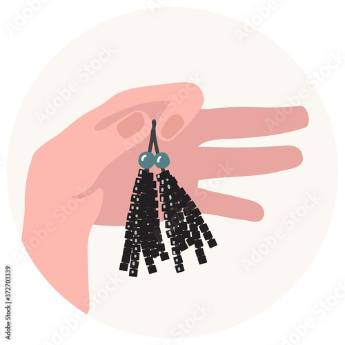Fotografie Vector illustration of the hand with bead earrings