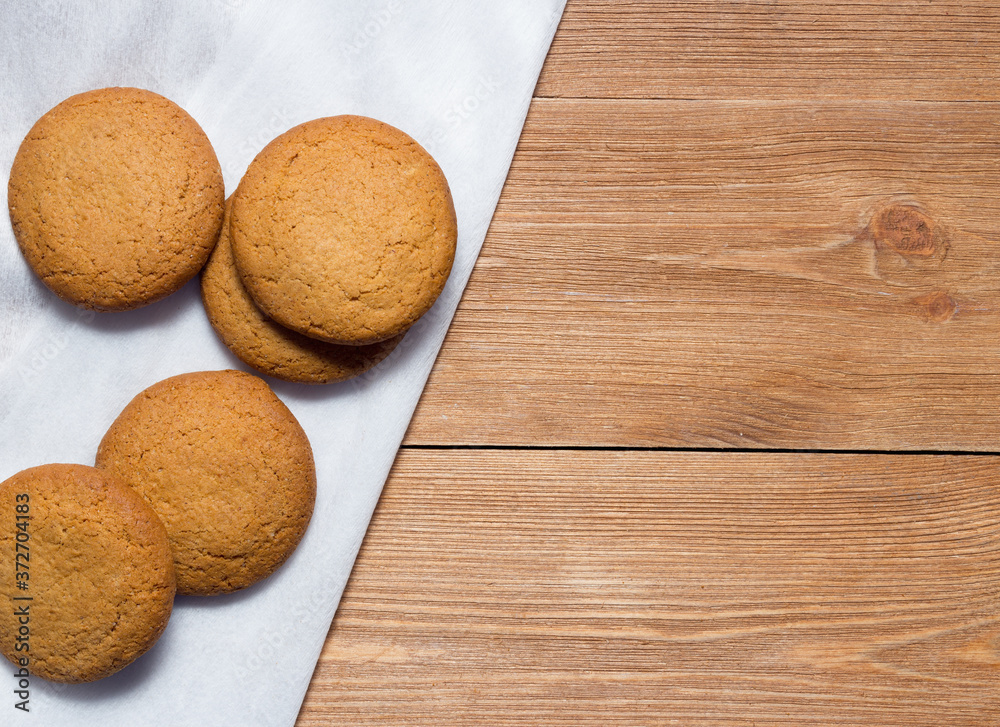 Homemade oatmeal cookie on the wooden background Homemade oatmeal cookie on the wooden background