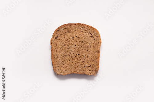 Assortment of baked bread on white background