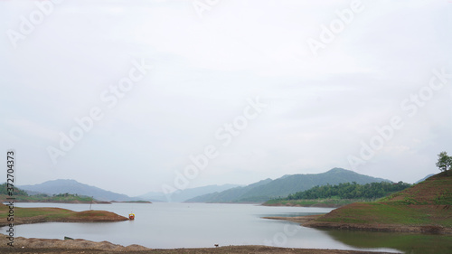 Beautiful  Landscape of the Narmada River Lake with Blue Mountains in the Background at Hafeshwar, kawant village, Chhotaudepur -Gujarat (INDIA)    photo