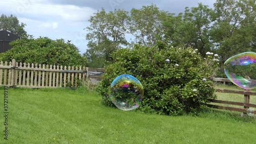 Giant Soap Bubble with a Bubble wand photo