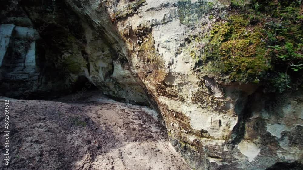 the Cliff of Sietiniezis Rock, Latvia. Gauja National Park. Pine Forest Tourist Trail With Pathwalk Near Sandstone Cliffs. the Cliff of Sietiniezis Rock, Latvia. Gauja National Park. Pine Forest Tourist Trail With Pathwalk Near Sandstone Cliffs.