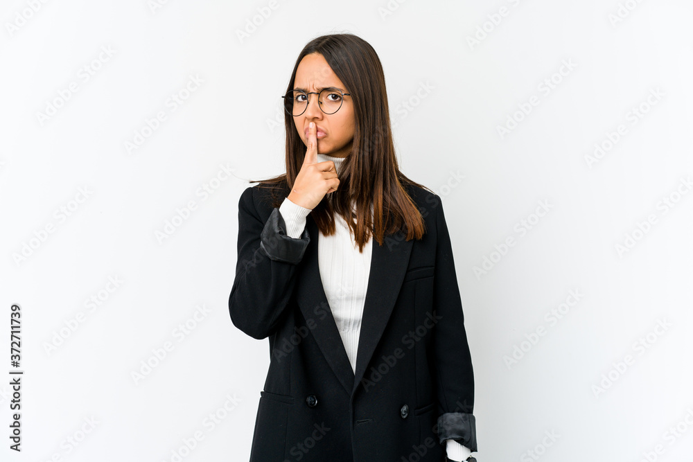 Young mixed race business woman isolated on white background thinking and looking up, being reflective, contemplating, having a fantasy. Young mixed race business woman isolated on white background thinking and looking up, being reflective, contemplating, having a fantasy.