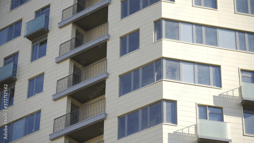 Windows and balconies of Apartment building in new residential sleeping area in Moscow