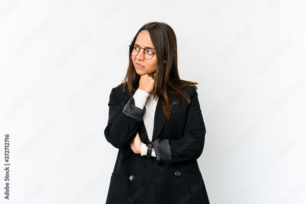 Young mixed race business woman isolated on white background suffers pain in throat due a virus or infection. Young mixed race business woman isolated on white background suffers pain in throat due a virus or infection.