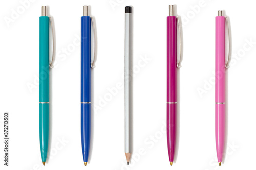 Four plastic pens and pencil on white isolated background.