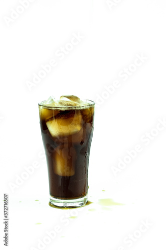 glass of cola with ice