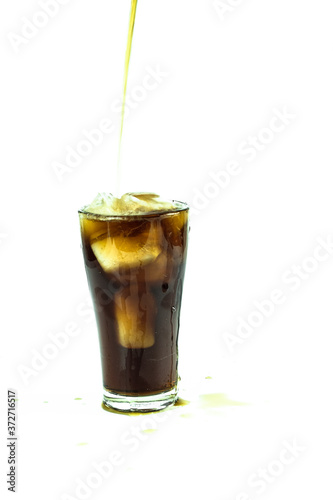 glass of cola with ice