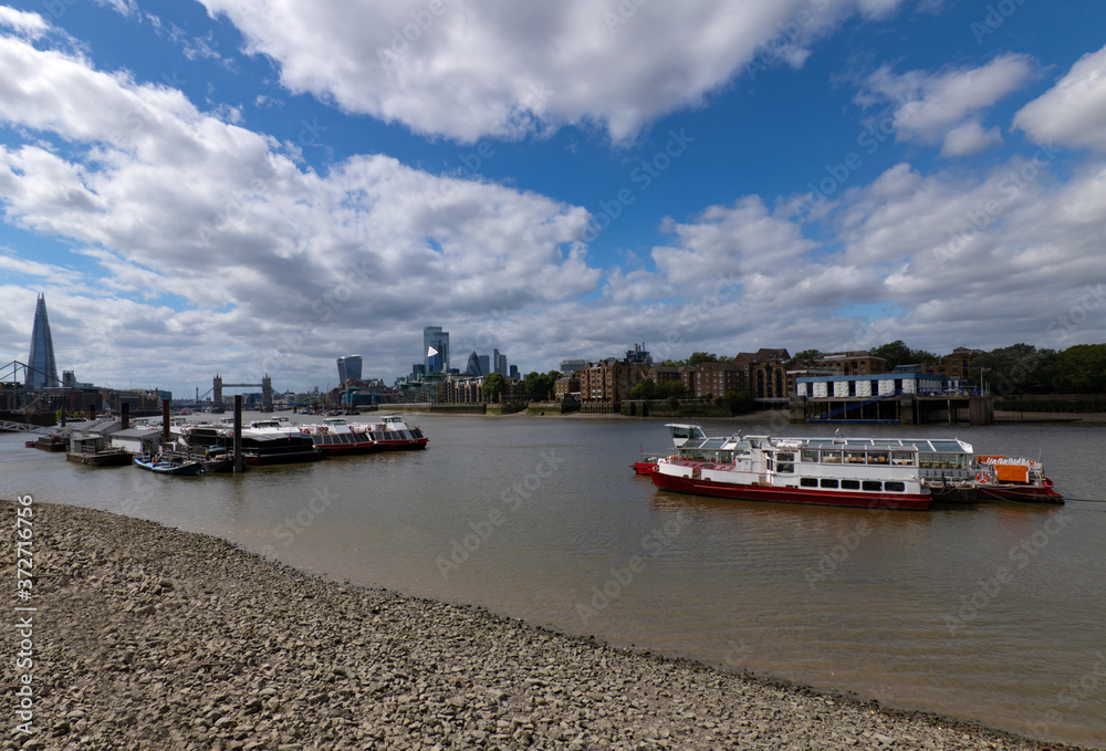 A view of the City of London from Bermondsey at low tide.