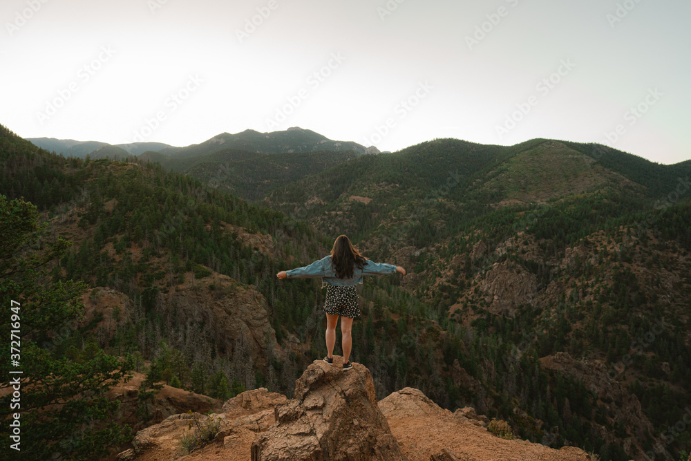 girl on the top of a mountain in Colorado