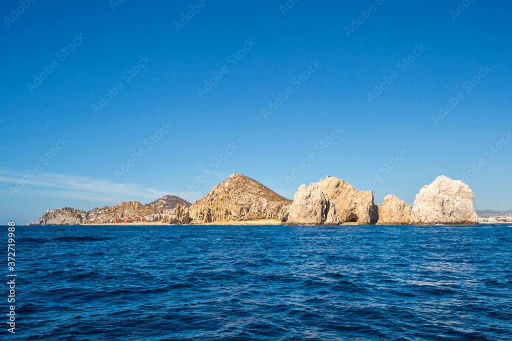 The arch of Cabo San Lucas, is a distinctive rock formation at the southern tip of Cabo San Lucas, which is itself the extreme southern end of Mexico's Baja California Peninsula. The arch of Cabo San Lucas, is a distinctive rock formation at the southern tip of Cabo San Lucas, which is itself the extreme southern end of Mexico's Baja California Peninsula.