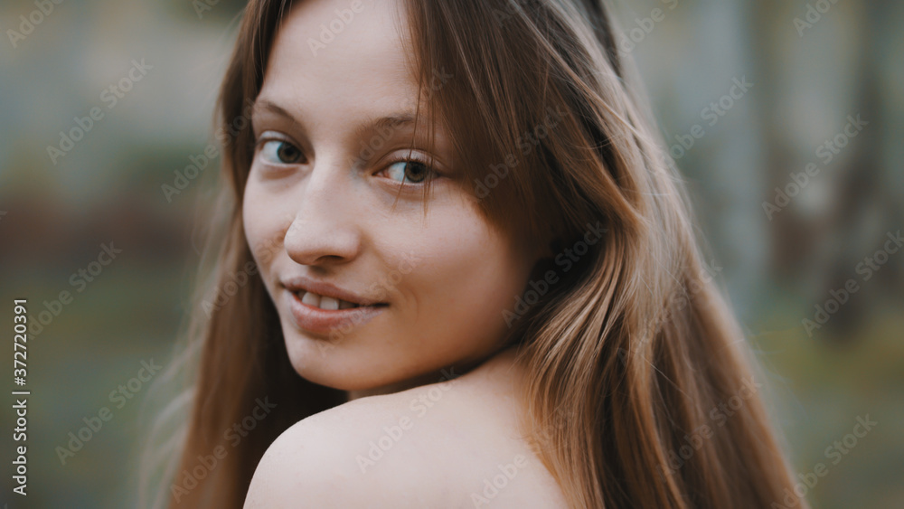 Natural beauty concept. Close up shot of caucasian woman with beautiful green eyes and frekles. Smiling girl. High quality photo Natural beauty concept. Close up shot of caucasian woman with beautiful green eyes and frekles. Smiling girl. High quality photo