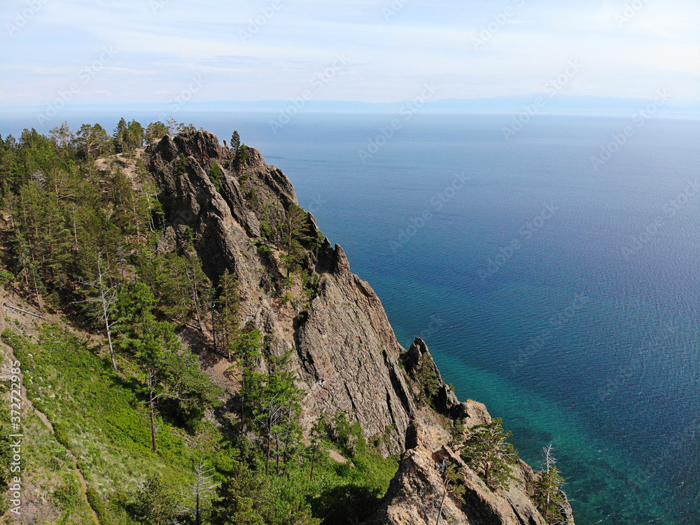 Beautiful view on the cliff-top Skriper. Lake Baikal from the air.