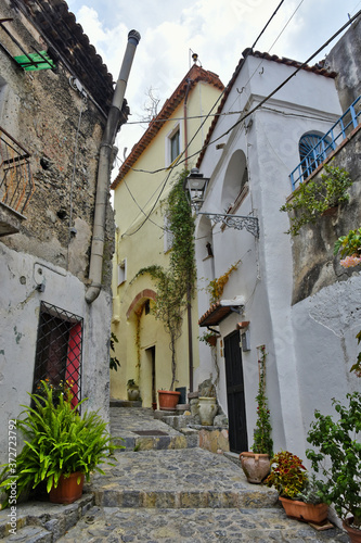 A narrow street among the old houses of Scalea, a rural village in the Calabria region. © Giambattista