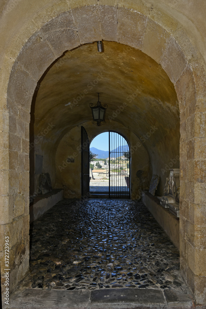 A narrow street among the old houses of Scalea, a rural village in the Calabria region.