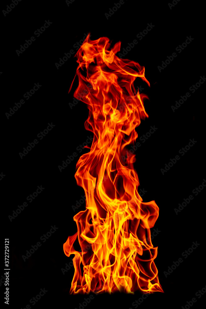 Fire flame isolated on black isolated background - Beautiful yellow, orange and red and red blaze fire flame texture style. Fire flame isolated on black isolated background - Beautiful yellow, orange and red and red blaze fire flame texture style.