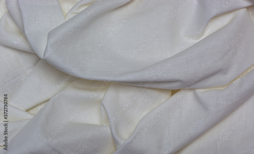 white crumpled cotton fabric textured background close-up