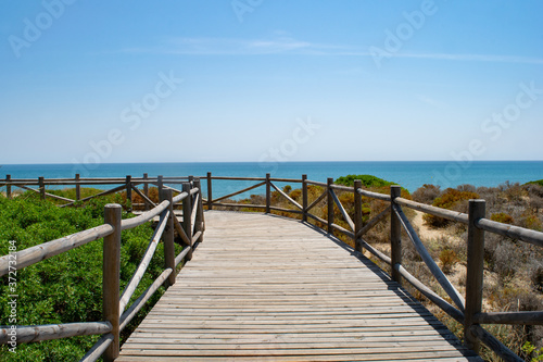 wooden walkway on a sand dune