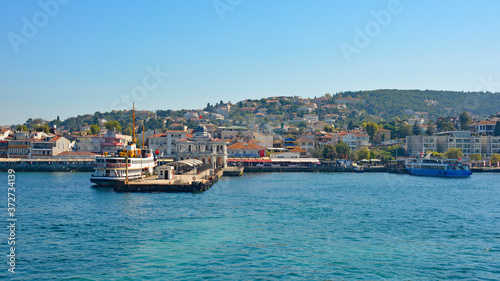 A ferry docked at the ferry station on Buyukada, one of the Princes' Islands, also known as Adalar, in the Sea of Marmara off the coast of Istanbul, Turkey