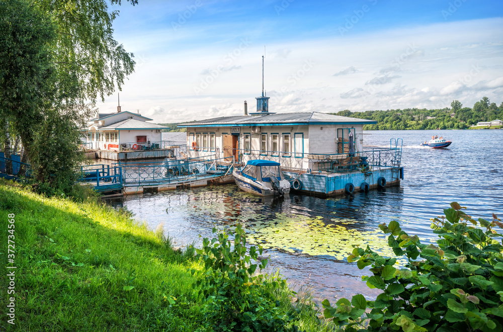 The pier building on the water of the Volga River in Plyos. Inscription: Plesk