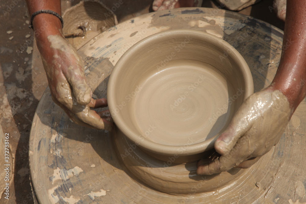 Potter at work, clay molding, man work clay, potter man Potter at work, clay molding, man work clay, potter man