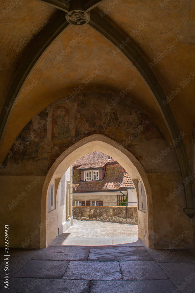 view through the arch of the city of Thun in Switzerland