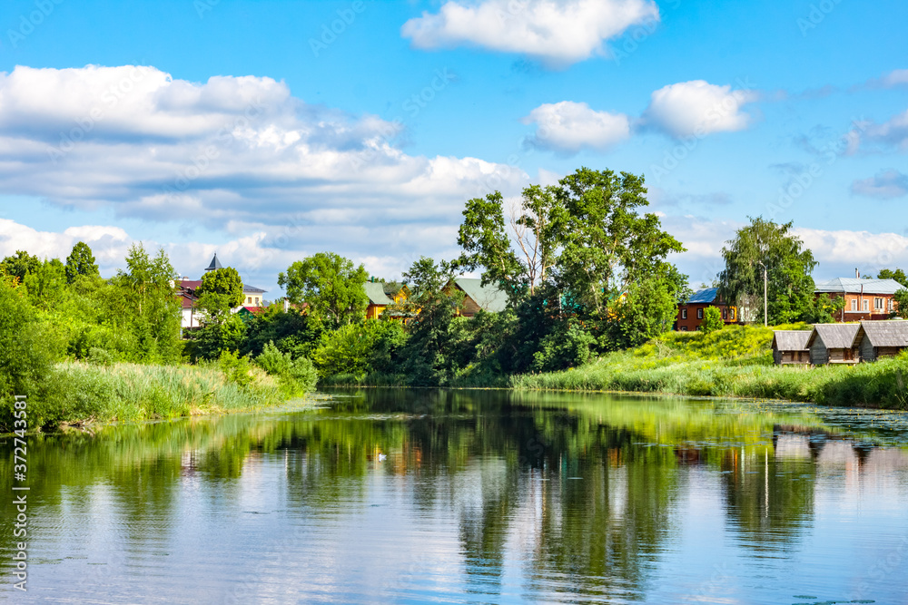 View of the Kamenka river in Suzdal, Russia. Beautiful summer landscape.