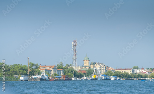 Sulina city in Danube Delta view from the river during a sunny morning