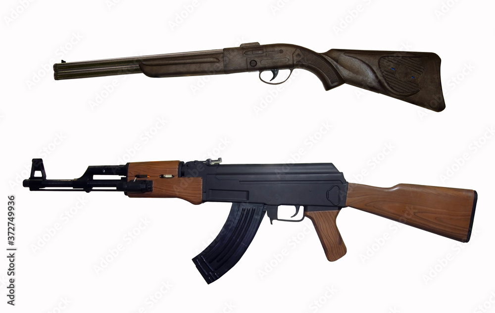 There are a rifle and an ak-47. White background. Isolated. There are a rifle and an ak-47. White background. Isolated.