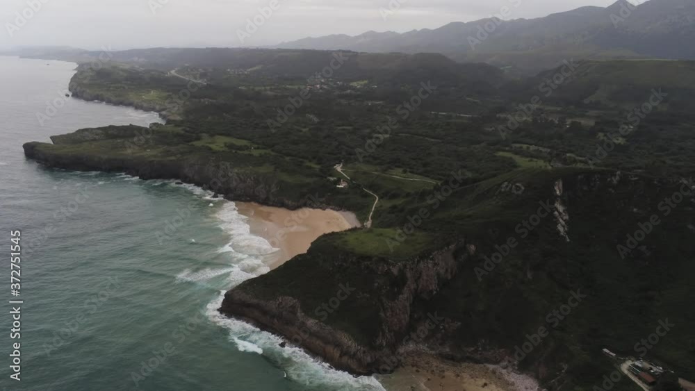 Beach in Asturias. Coastal landscape in Cue, beach of Llanes. Spain. Aerial Drone Footage Beach in Asturias. Coastal landscape in Cue, beach of Llanes. Spain. Aerial Drone Footage