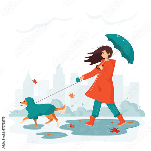 Happy young woman with umbrella walks a dog in a raincoat in city park in rainy autumn. Concept of outdoor activity in bad weather with a pet. Dog from shelter is the best friend. Vector illustration