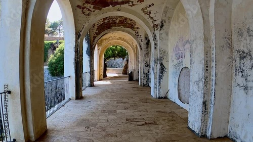 Archway at the picturesque mediterranean sea (Camino de Ronda, S'Agaro, Catalonia, Spain) photo