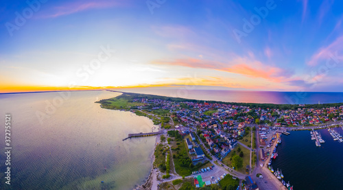 Fototapeta Naklejka Na Ścianę i Meble -  Beautiful Panorama color sky, sunset by the Baltic Sea, Jastarnia, Poland. Harbor. Aerial View