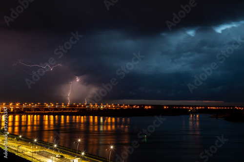 Fototapeta Naklejka Na Ścianę i Meble -  lightning over the river