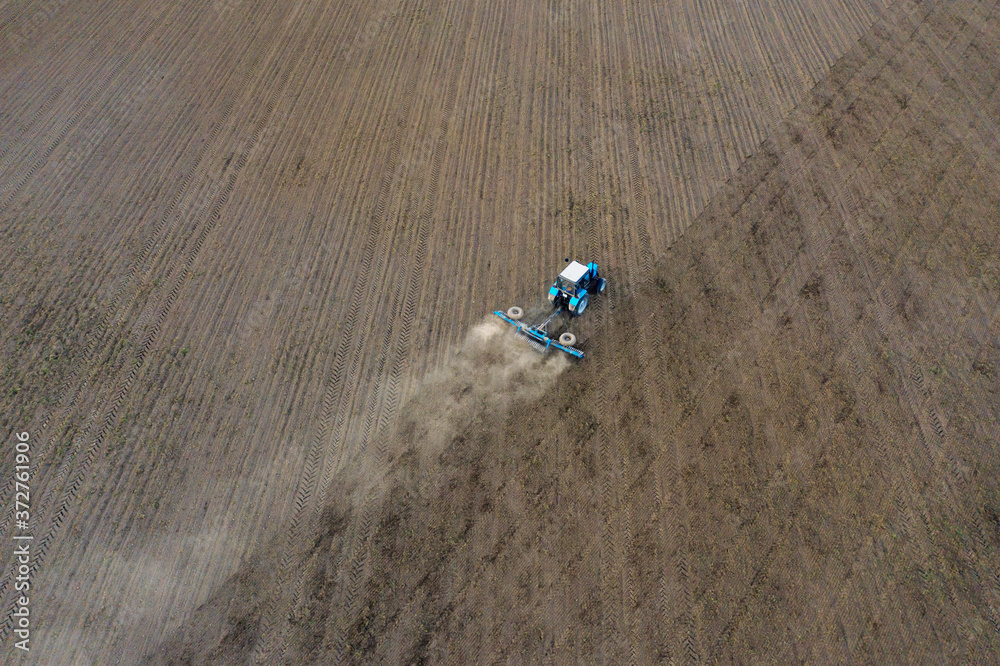 The tractor prepares the field. Drone photo