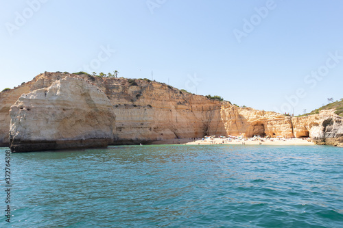 View from the sea of Carvoeiro beach. The Lagoa region has a coastline formed of towering cliffs, turquoise waters and picturesque beaches. The beaches of Carvoeiro are found within sheltered coves © Alfredo
